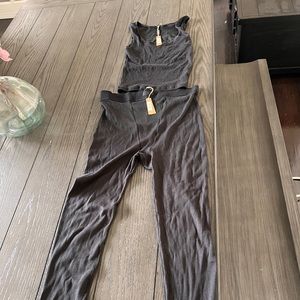 SKIMS boyfriend ribbed lounge leggings and tank.